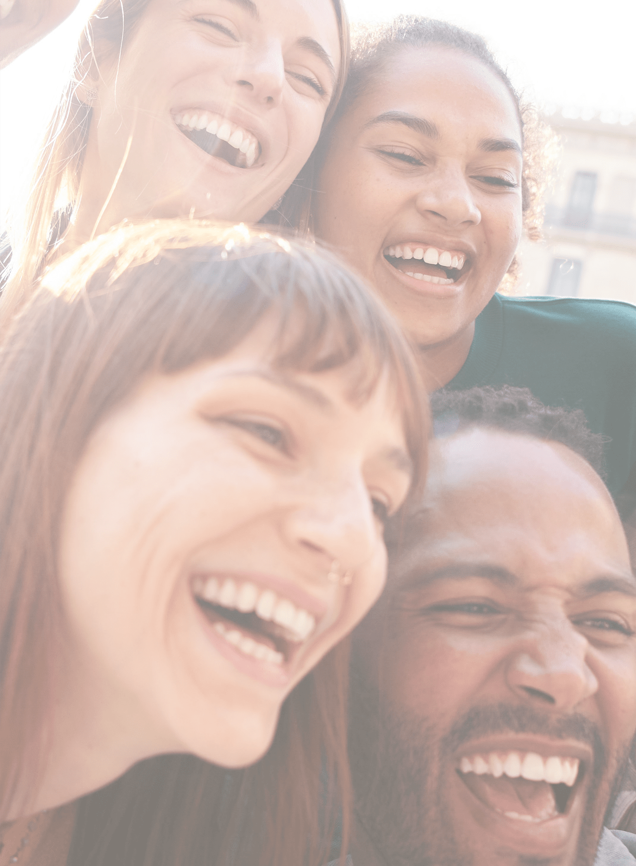 Happy smiling multi-ethnic group friends having fun together. Multiracial diverse young colleagues embracing posing for selfie photo on street in city. Multicultural friendship generation Z concept.